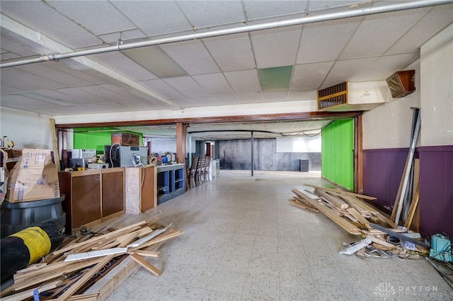 531 W Ash St, Piqua, OH 45356 - misc room featuring tile patterned floors, a wainscoted wall, and a paneled ceiling