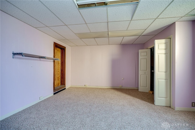 531 W Ash St, Piqua, OH 45356 - unfurnished bedroom featuring carpet floors and a paneled ceiling
