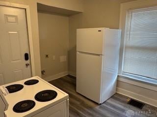 114 N Garland Ave, Dayton, OH 45403 - kitchen featuring white cabinetry, dark wood finished floors, baseboards, white appliances, and visible vents