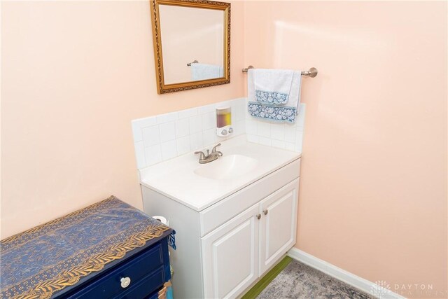 82 Notre Dame Ave, Dayton, OH 45404 - bathroom featuring vanity and backsplash