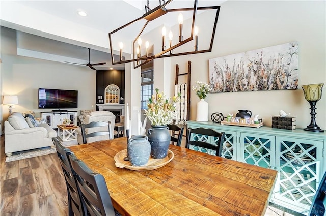 703 Doral Ct, Dayton, OH 45458 - dining space with a ceiling fan, wood finished floors, a chandelier, and recessed lighting