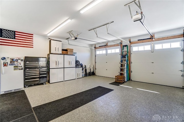 703 Doral Ct, Dayton, OH 45458 - garage featuring a garage door opener