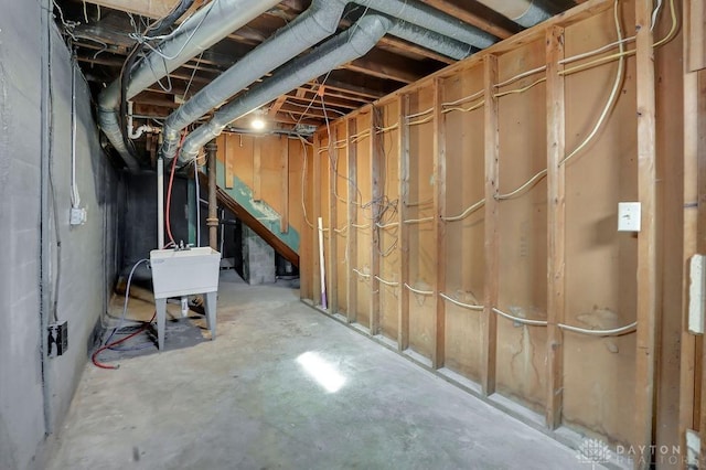 unfinished basement with a sink
