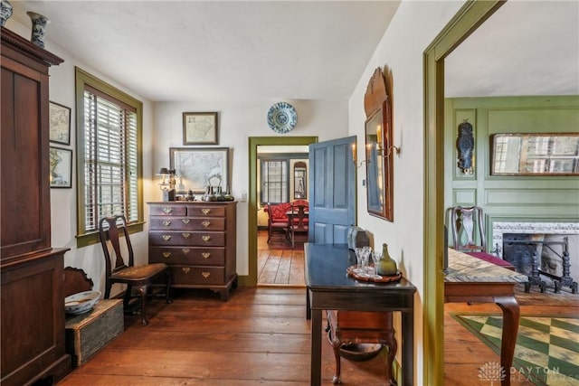 corridor with dark wood-style flooring