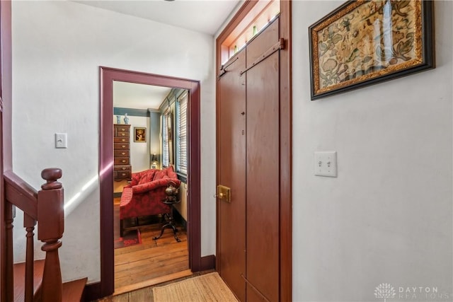 hallway featuring light wood-style floors