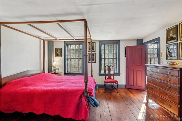 bedroom with hardwood / wood-style floors
