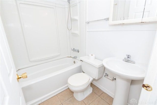 bathroom with shower / bathing tub combination, baseboards, toilet, and tile patterned flooring