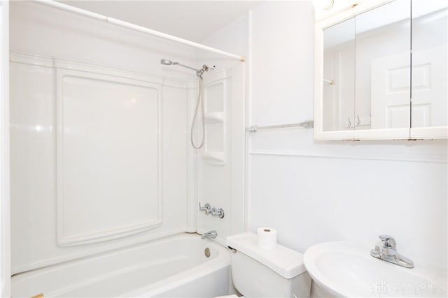 full bath featuring a sink, toilet, and shower / bathtub combination