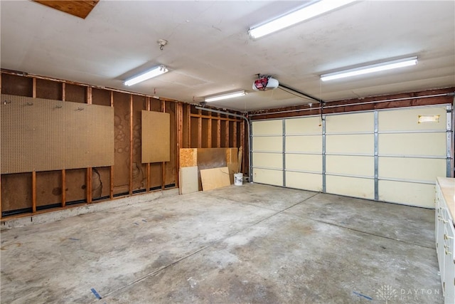 garage featuring a garage door opener