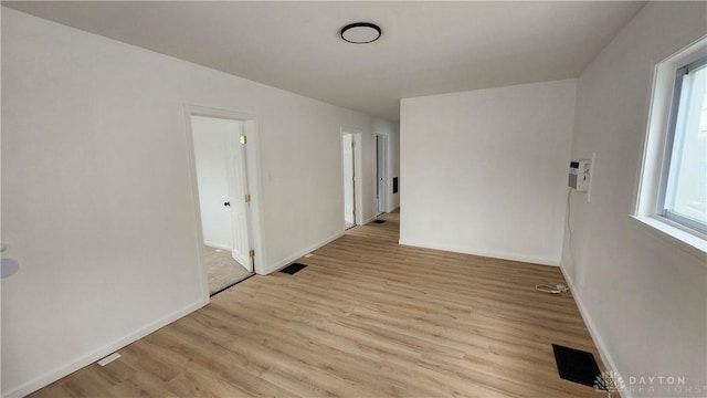 229 First, Piqua, OH 45356 - empty room with light wood-style flooring and baseboards