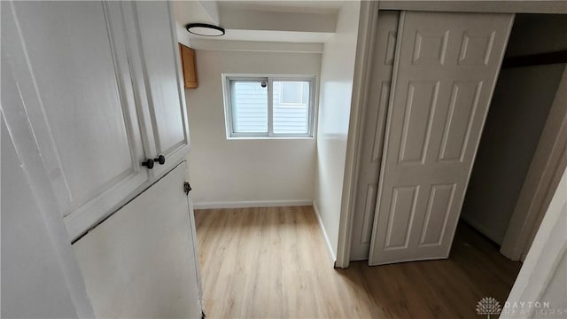 229 First, Piqua, OH 45356 - hallway featuring wood finished floors and baseboards