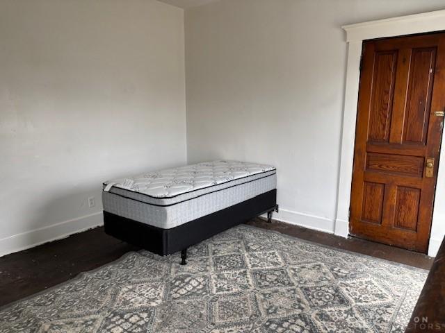 324 Warren St, Dayton, OH 45402 - bedroom with baseboards and wood finished floors