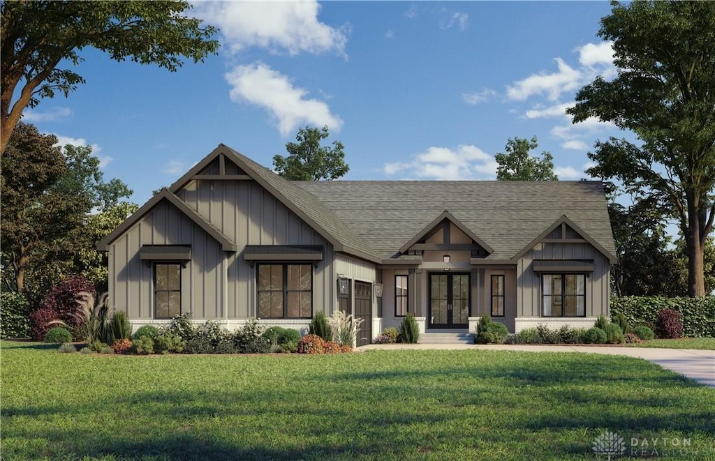 9161 Remy Ct, Centerville, OH 45458 - view of front facade with french doors, board and batten siding, a front lawn, and roof with shingles