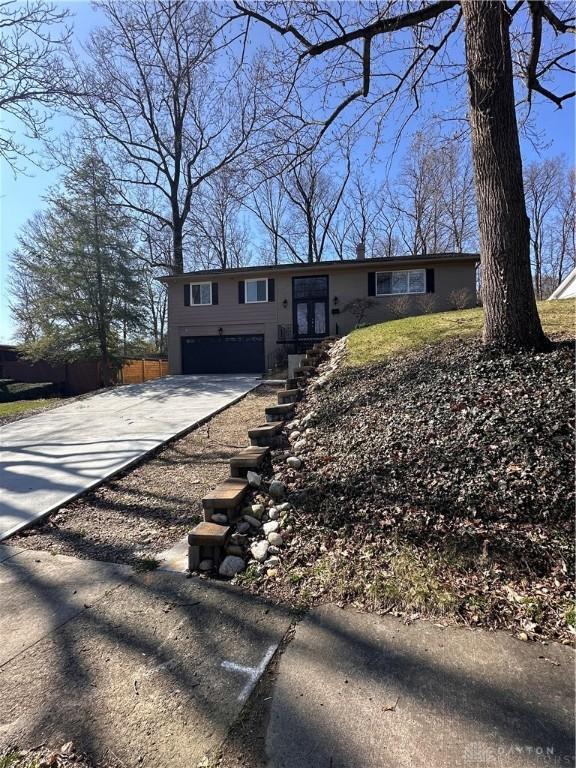 1314 Ridgeview Ave, Dayton, OH 45409 - single story home with driveway and a garage