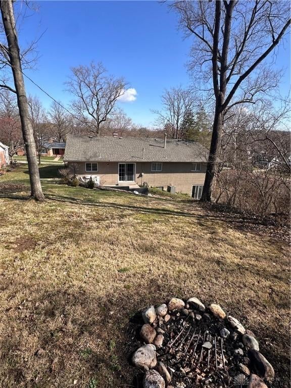 1314 Ridgeview Ave, Dayton, OH 45409 - back of house featuring a yard