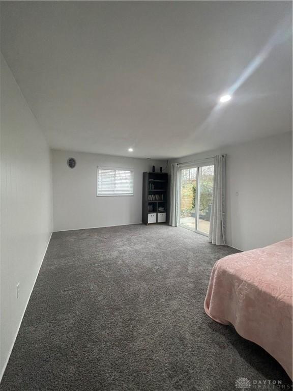 1314 Ridgeview Ave, Dayton, OH 45409 - bedroom featuring access to exterior, carpet flooring, multiple windows, and recessed lighting