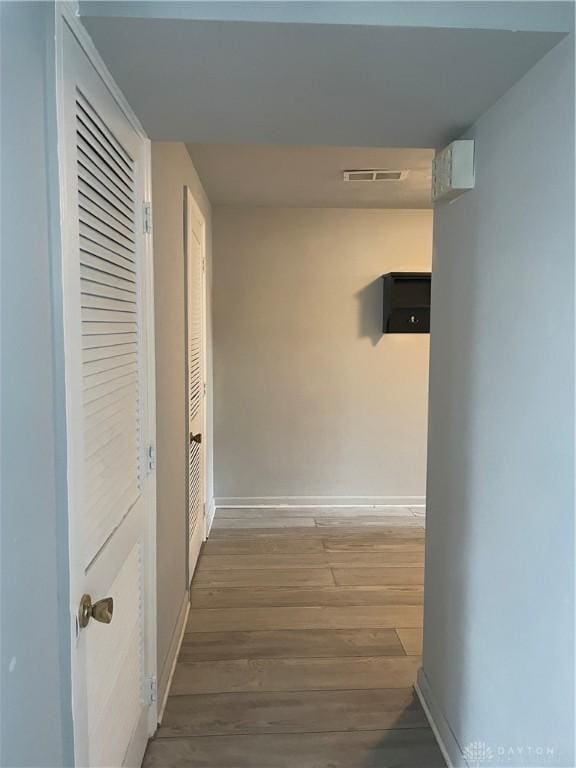 1314 Ridgeview Ave, Dayton, OH 45409 - hallway featuring wood finished floors and baseboards