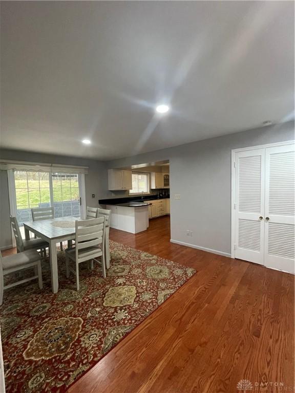 1314 Ridgeview Ave, Dayton, OH 45409 - dining room featuring dark wood-style flooring and recessed lighting