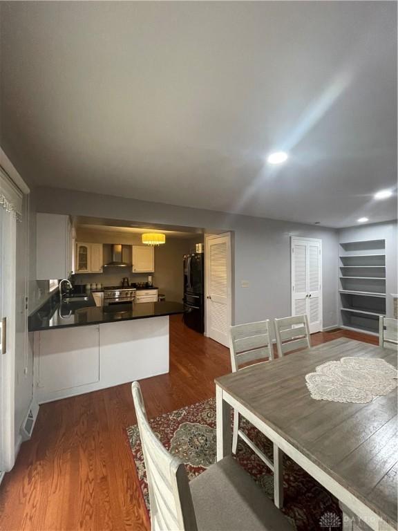 1314 Ridgeview Ave, Dayton, OH 45409 - dining area with dark wood-type flooring and recessed lighting