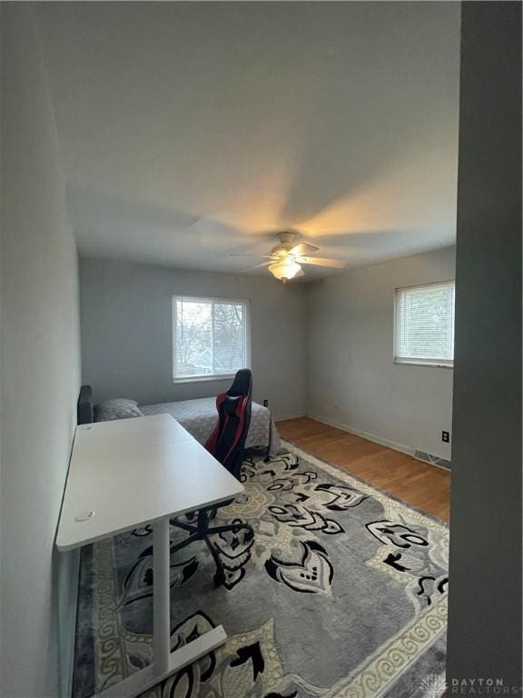 1314 Ridgeview Ave, Dayton, OH 45409 - home office featuring healthy amount of natural light, light wood-style flooring, and a ceiling fan