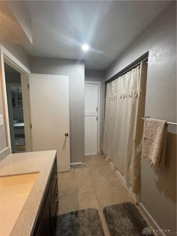 1314 Ridgeview Ave, Dayton, OH 45409 - full bath with vanity, tile patterned flooring, and recessed lighting