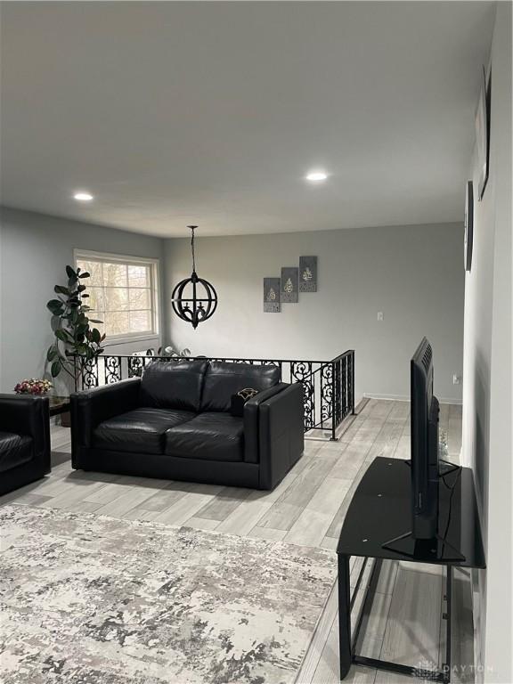 1314 Ridgeview Ave, Dayton, OH 45409 - living area featuring light wood-style floors and recessed lighting
