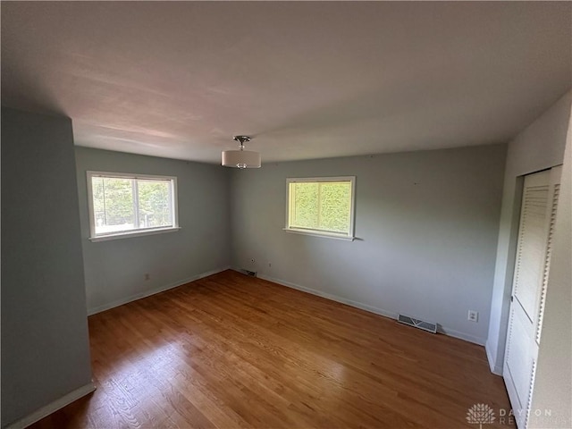 1314 Ridgeview Ave, Dayton, OH 45409 - unfurnished bedroom featuring wood finished floors and baseboards