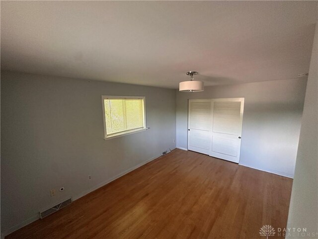 1314 Ridgeview Ave, Dayton, OH 45409 - unfurnished room with wood finished floors and baseboards