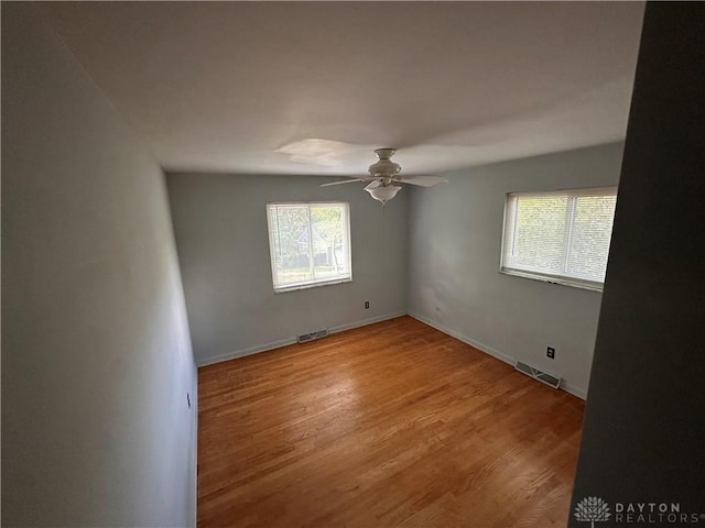 1314 Ridgeview Ave, Dayton, OH 45409 - spare room featuring wood finished floors and ceiling fan