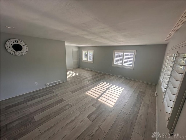 1314 Ridgeview Ave, Dayton, OH 45409 - spare room with wood finished floors and stairs