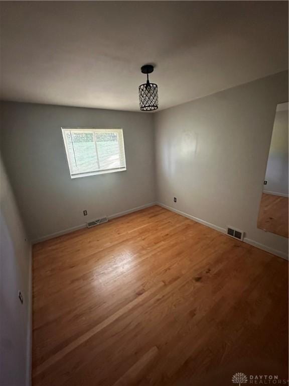 1314 Ridgeview Ave, Dayton, OH 45409 - unfurnished room with light wood-style floors and baseboards