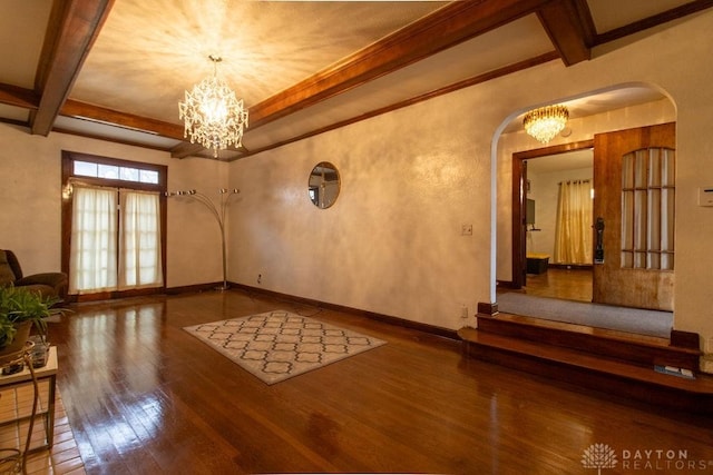 interior space with arched walkways, beam ceiling, hardwood / wood-style flooring, and a chandelier