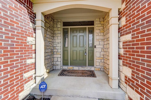 1713 Country Corner Ln, Washington Twp, OH 45458 - view of exterior entry featuring stone siding