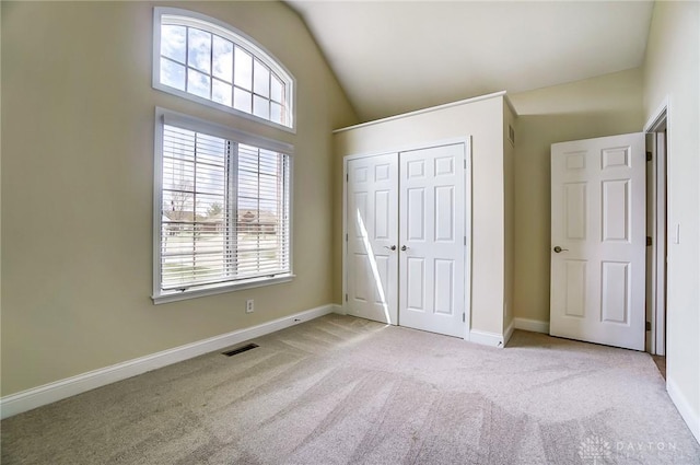 1713 Country Corner Ln, Washington Twp, OH 45458 - unfurnished bedroom featuring carpet floors, a closet, lofted ceiling, and baseboards