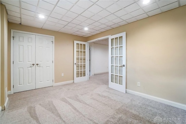 1713 Country Corner Ln, Washington Twp, OH 45458 - unfurnished bedroom featuring french doors, carpet floors, baseboards, a closet, and recessed lighting