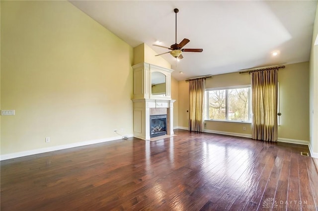 1713 Country Corner Ln, Washington Twp, OH 45458 - unfurnished living room with ceiling fan, a fireplace, dark wood-type flooring, baseboards, and high vaulted ceiling