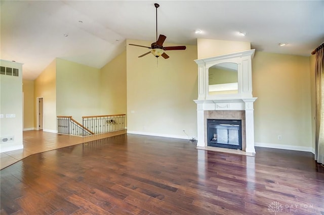 1713 Country Corner Ln, Washington Twp, OH 45458 - unfurnished living room featuring a ceiling fan, wood finished floors, a fireplace, baseboards, and high vaulted ceiling