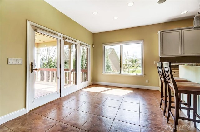 1713 Country Corner Ln, Washington Twp, OH 45458 - unfurnished dining area featuring baseboards, tile patterned flooring, and recessed lighting