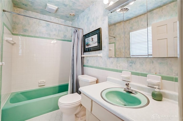 127 W Woodbury Dr, Dayton, OH 45415 - bathroom with vanity, toilet, visible vents, tile patterned flooring, and shower / bath combination with curtain