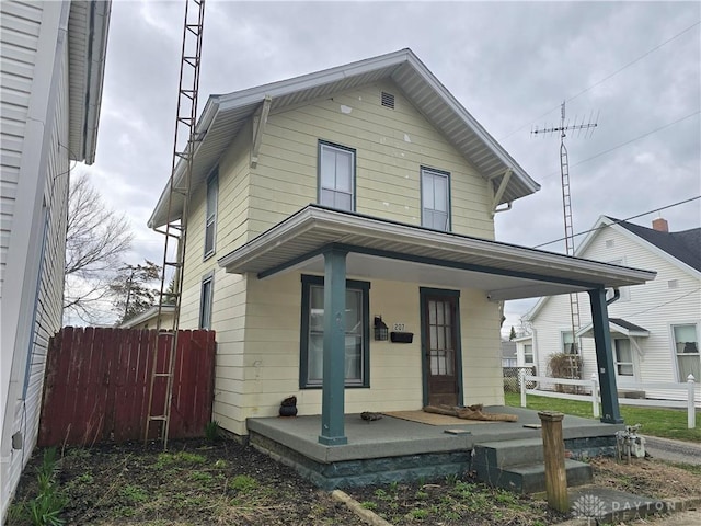 207 E Main St, New Paris, OH 45347 - view of front of home featuring a porch