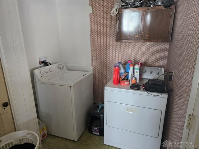 207 E Main St, New Paris, OH 45347 - laundry room featuring washing machine and dryer and cabinet space