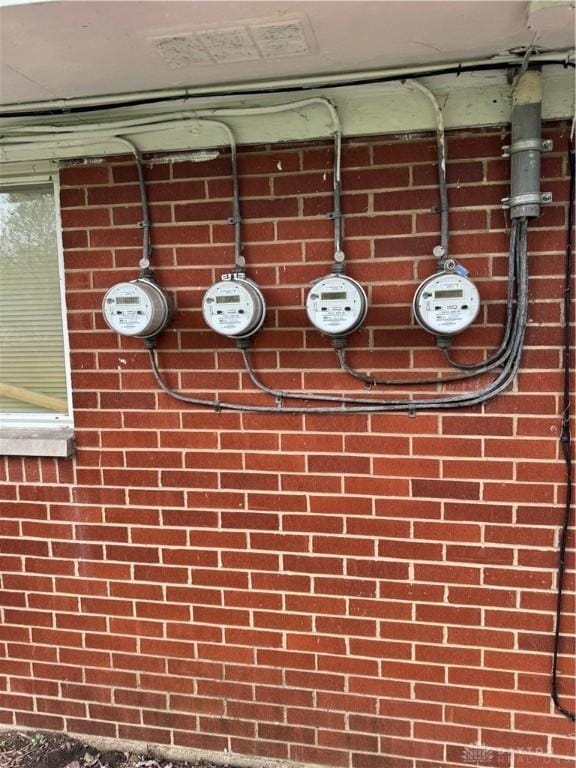 325 Ryburn Ave Unit 319-325, Dayton, OH 45405 - exterior view of electric meter and brick wall