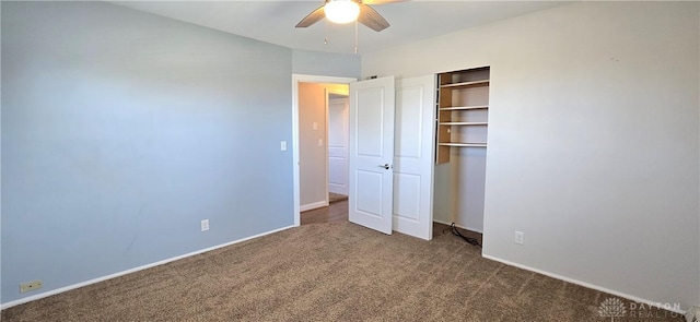 unfurnished bedroom with baseboards, ceiling fan, a closet, and carpet floors