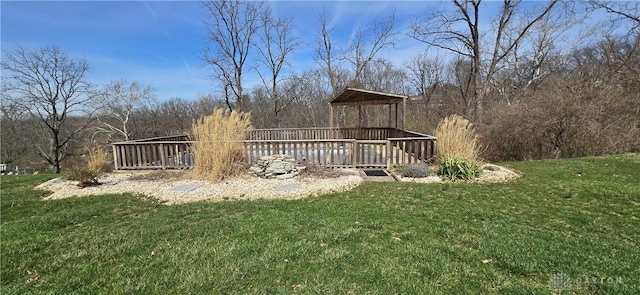 view of yard with a wooden deck