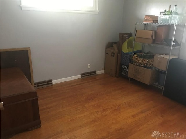 7581 Lockwood St, Dayton, OH 45415 - bedroom with wood finished floors and baseboards