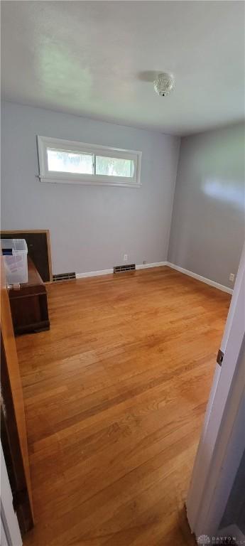 7581 Lockwood St, Dayton, OH 45415 - office space featuring light wood-style flooring and baseboards