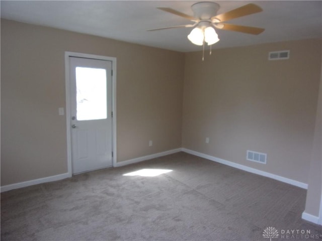 127 New Burlington Rd, Waynesville, OH 45068 - unfurnished room featuring baseboards, visible vents, carpet flooring, and a ceiling fan