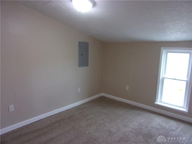 127 New Burlington Rd, Waynesville, OH 45068 - empty room with baseboards, light colored carpet, and electric panel