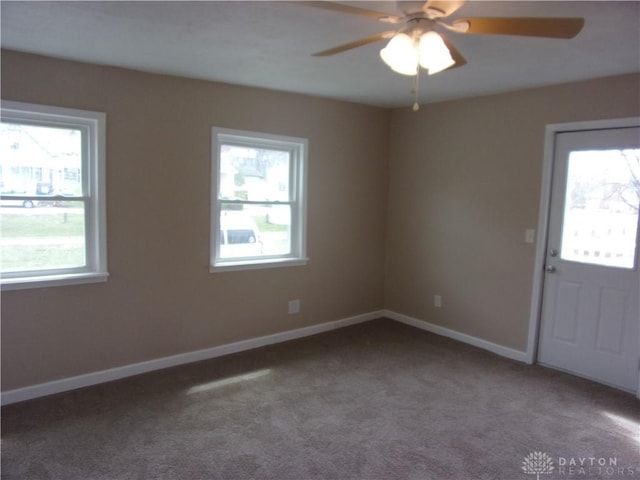 127 New Burlington Rd, Waynesville, OH 45068 - carpeted empty room featuring baseboards, ceiling fan, and a healthy amount of sunlight