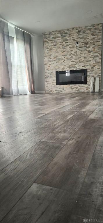 unfurnished living room with a fireplace